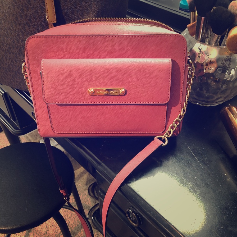 Pink cross the body bag.